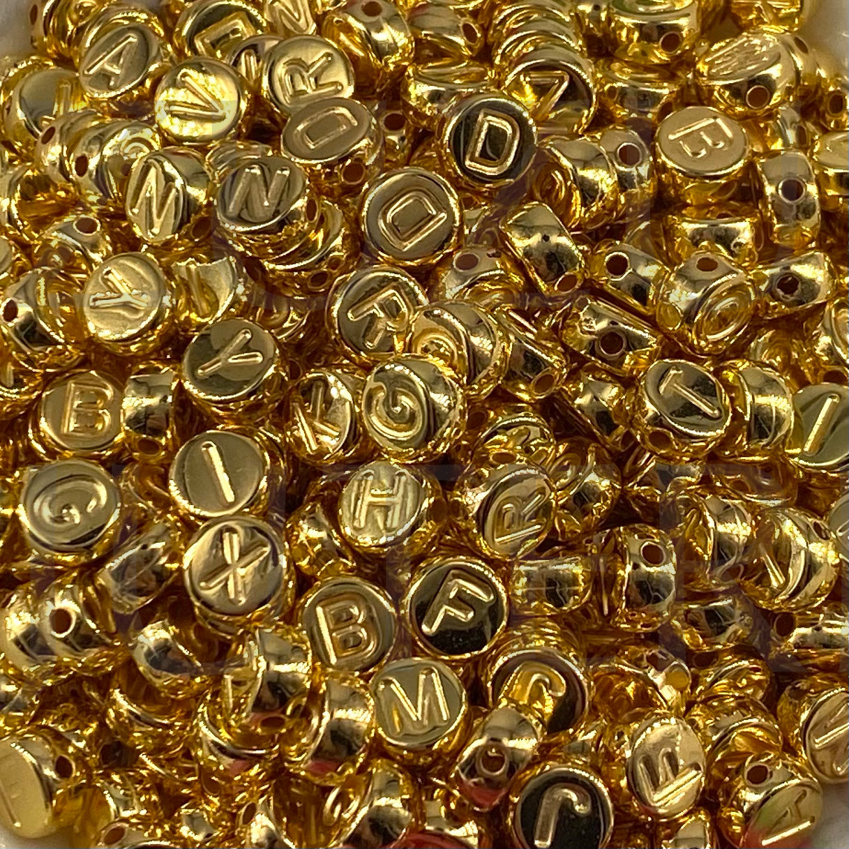Conta Letras Douradas Sortidas 7mm (Pack 100pc)